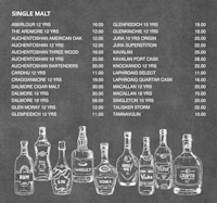 a chalkboard with a list of different types of whisky
