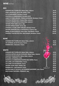 a menu for a wine bar with a pink wine glass