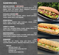 the menu for a sandwich shop is shown on a black background